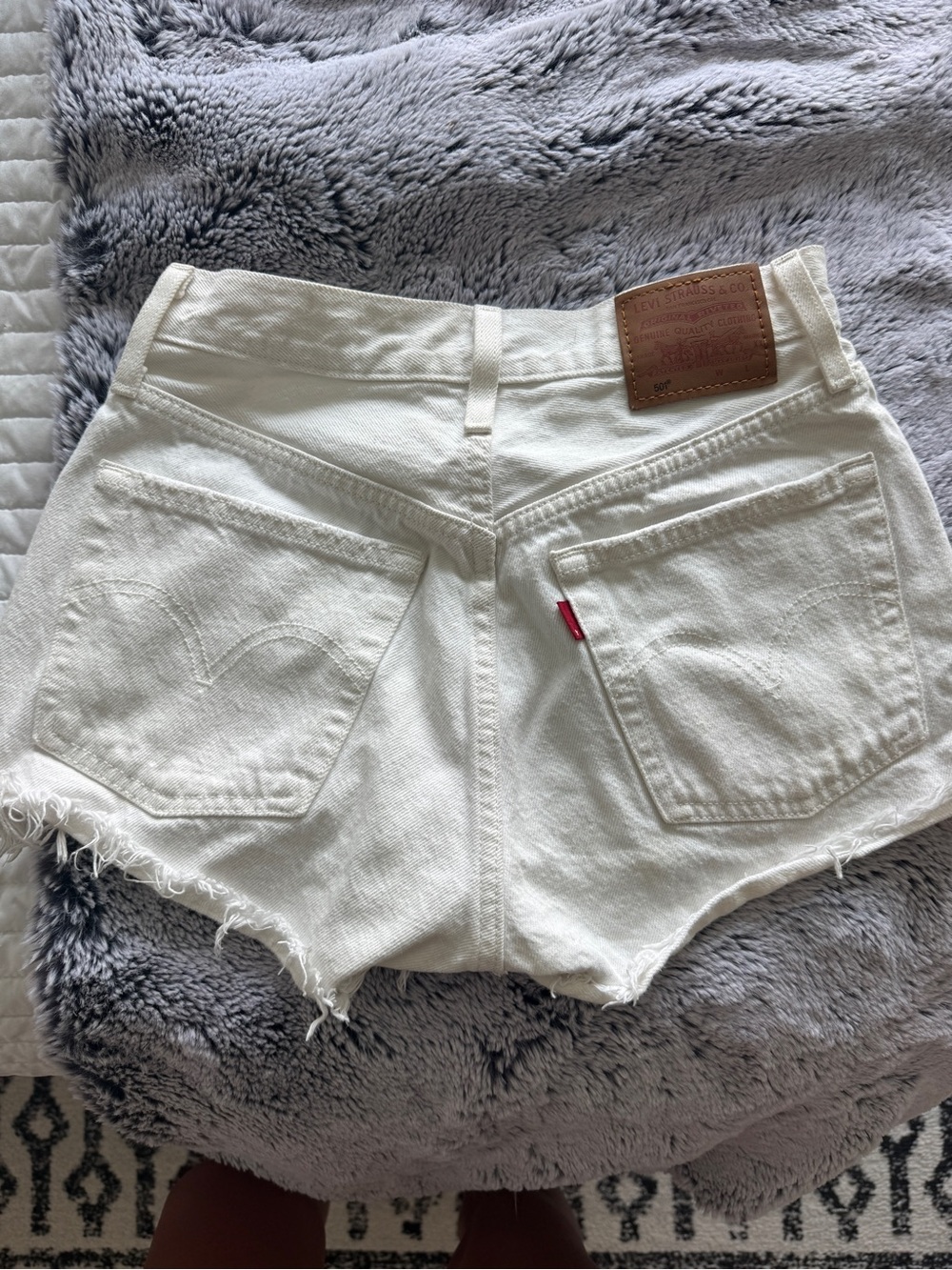 Levi's White Denim Cutoff Shorts with Frayed Hem